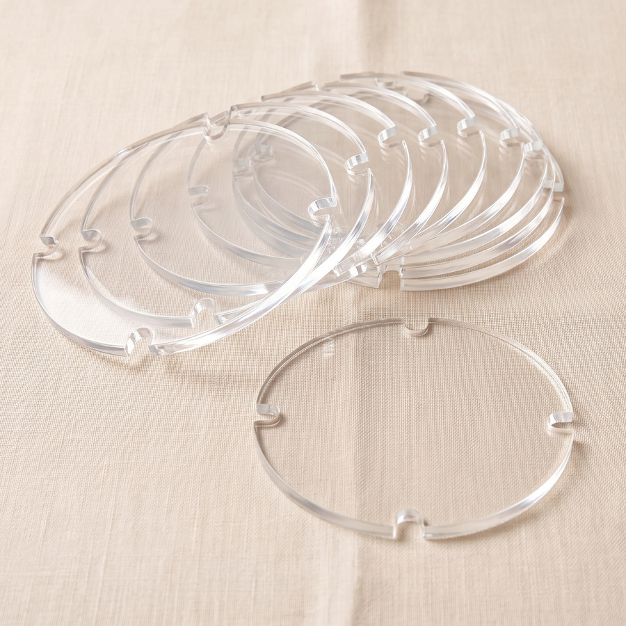 Ten clear DooRep acrylic lids