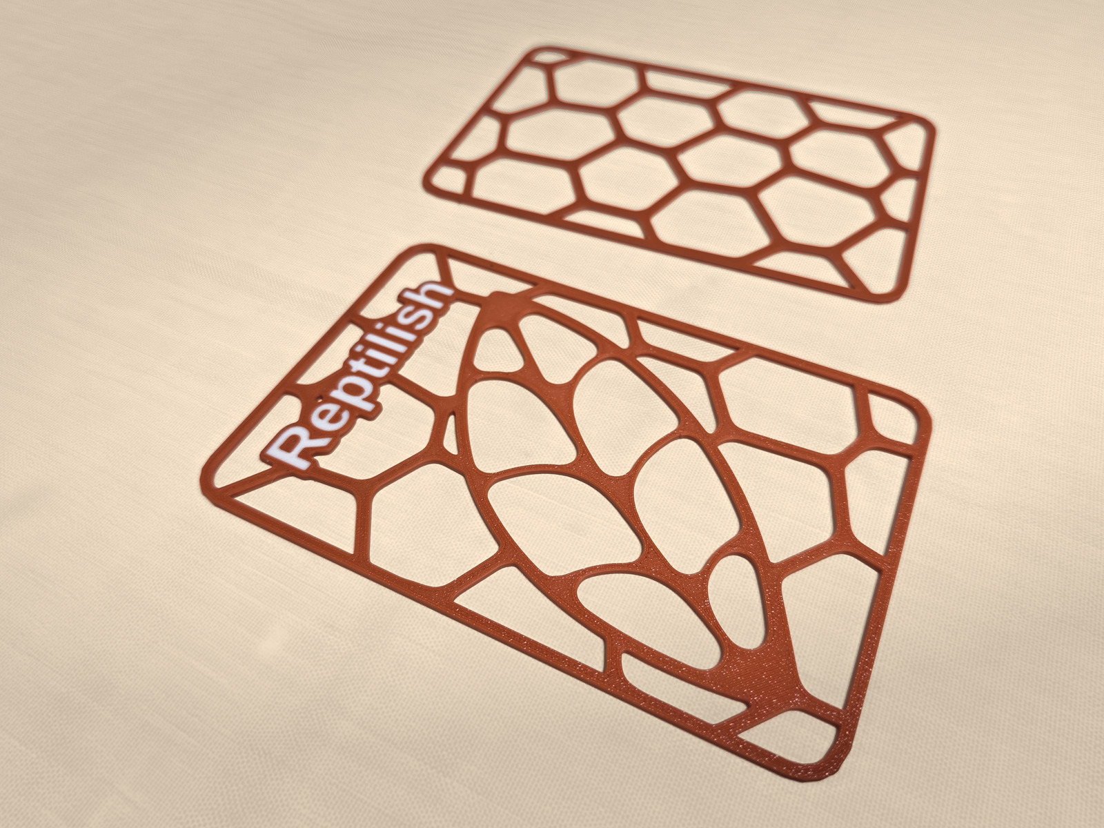 Rectangular Terracotta plates: one without engraving, and one with engraved text and a leaf motif
